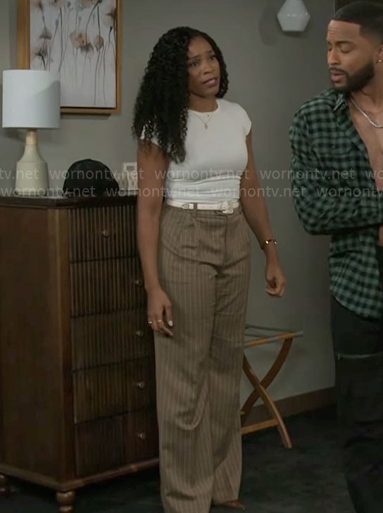 Naomi’s beige pinstripe pants on Beyond the Gates