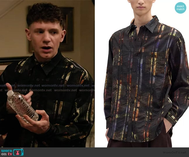 Jacob’s black striped shirt on Abbott Elementary