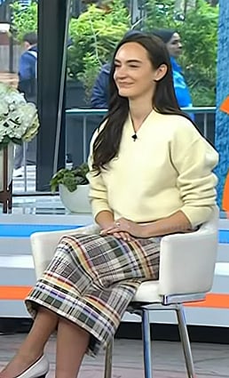 Olivia Perez's yellow v-neck sweater and plaid skirt on Today