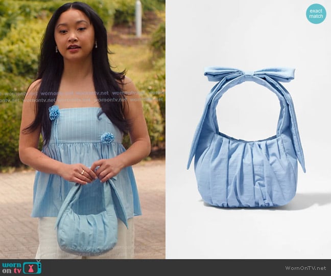 & Other Stories Small Bow Embellished Bag in Light Blue worn by Lara Jean Covey (Lana Condor) on XO Kitty