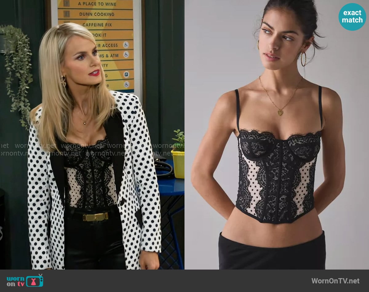 Out From Under at Urban Outfitters Modern Love Corset in Black Polka Dot worn by Vanessa McBride (Lauren Buglioli) on Beyond the Gates
