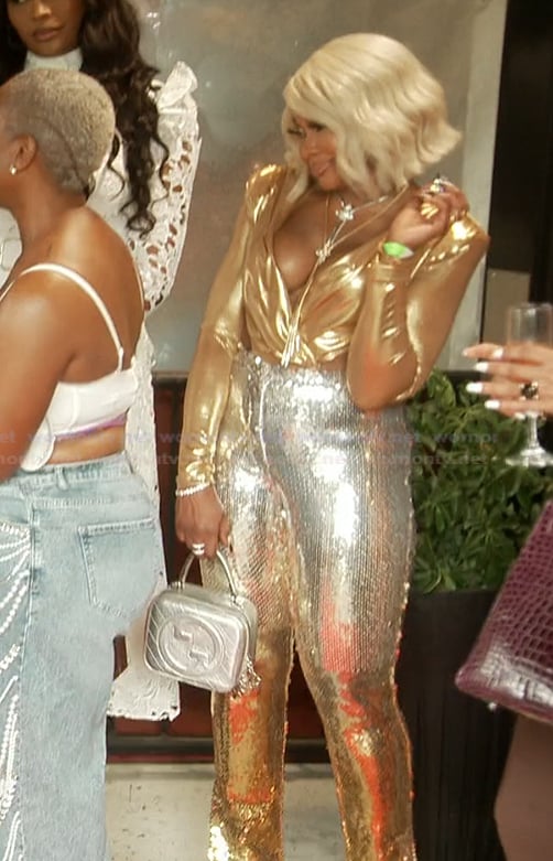 Phaedra's metallic jeans and bodysuit on The Real Housewives of Atlanta