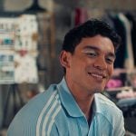 Q’s blue waffle polo on XO Kitty