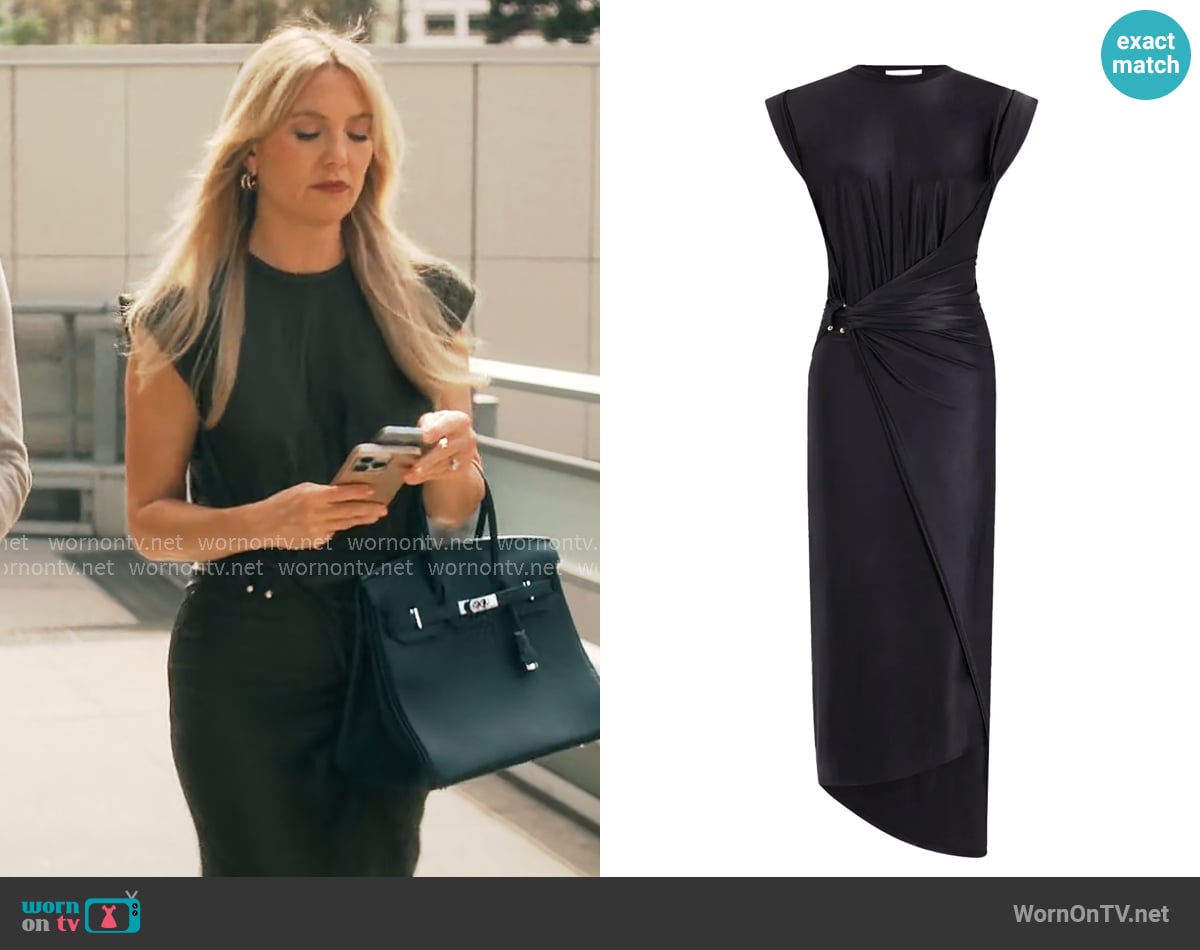 Isla’s black draped dress with metal details on Running Point