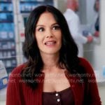 Charlie’s brown button front top and red cardigan on Scrubs