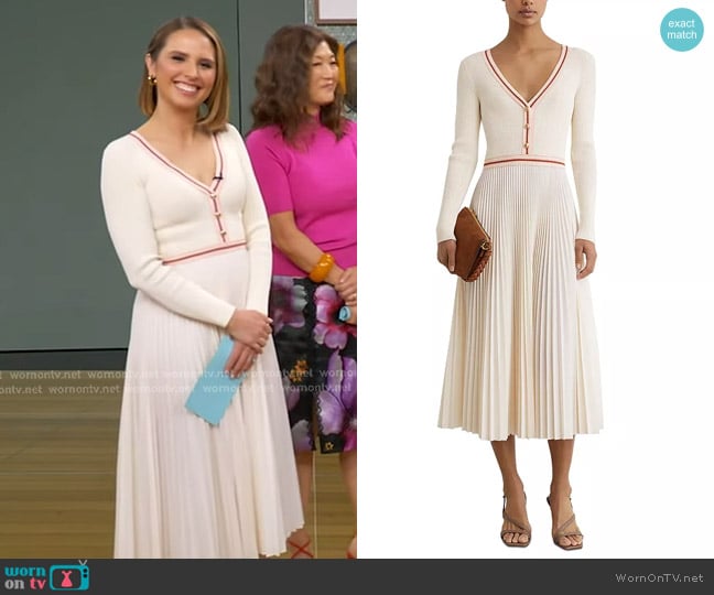 Elizabeth’s white v-neck pleated knit dress on GMA