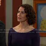 Sarah’s navy long sleeve top on Days of our Lives