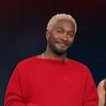 Scott’s red logo embroidered sweater on Access Hollywood