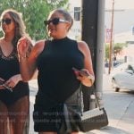 Brittany's black leather tie skirt on The Valley