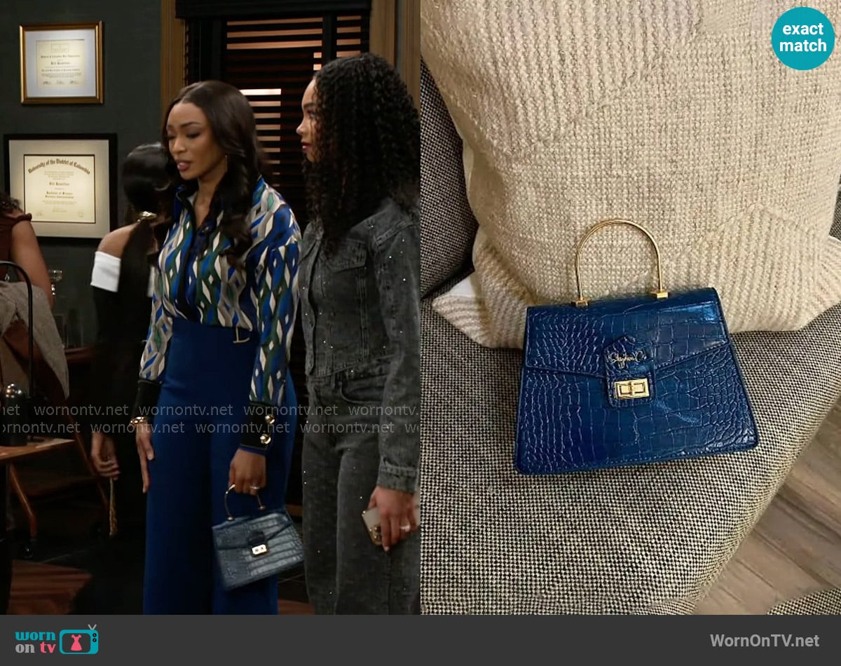 Shydiva Tracee Bag worn by Madison Montgomery (Kenjah) on Beyond the Gates