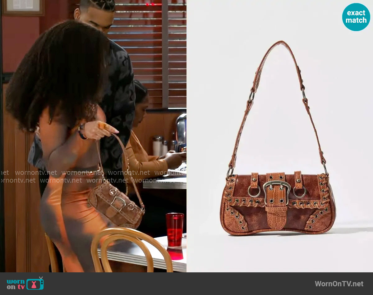 Silence + Noise at Urban Outfitters Jade Laced Rivet Bag worn by Eva Thomas (Ambyr Michelle) on Beyond the Gates
