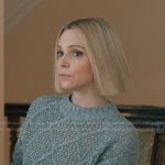 Sloan’s gray cableknit sweater on Elsbeth