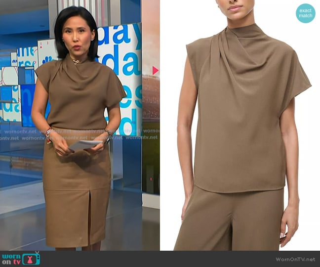 Staud Davina Asymmetric Top in Truffle worn by Vicky Nguyen on NBC News Daily