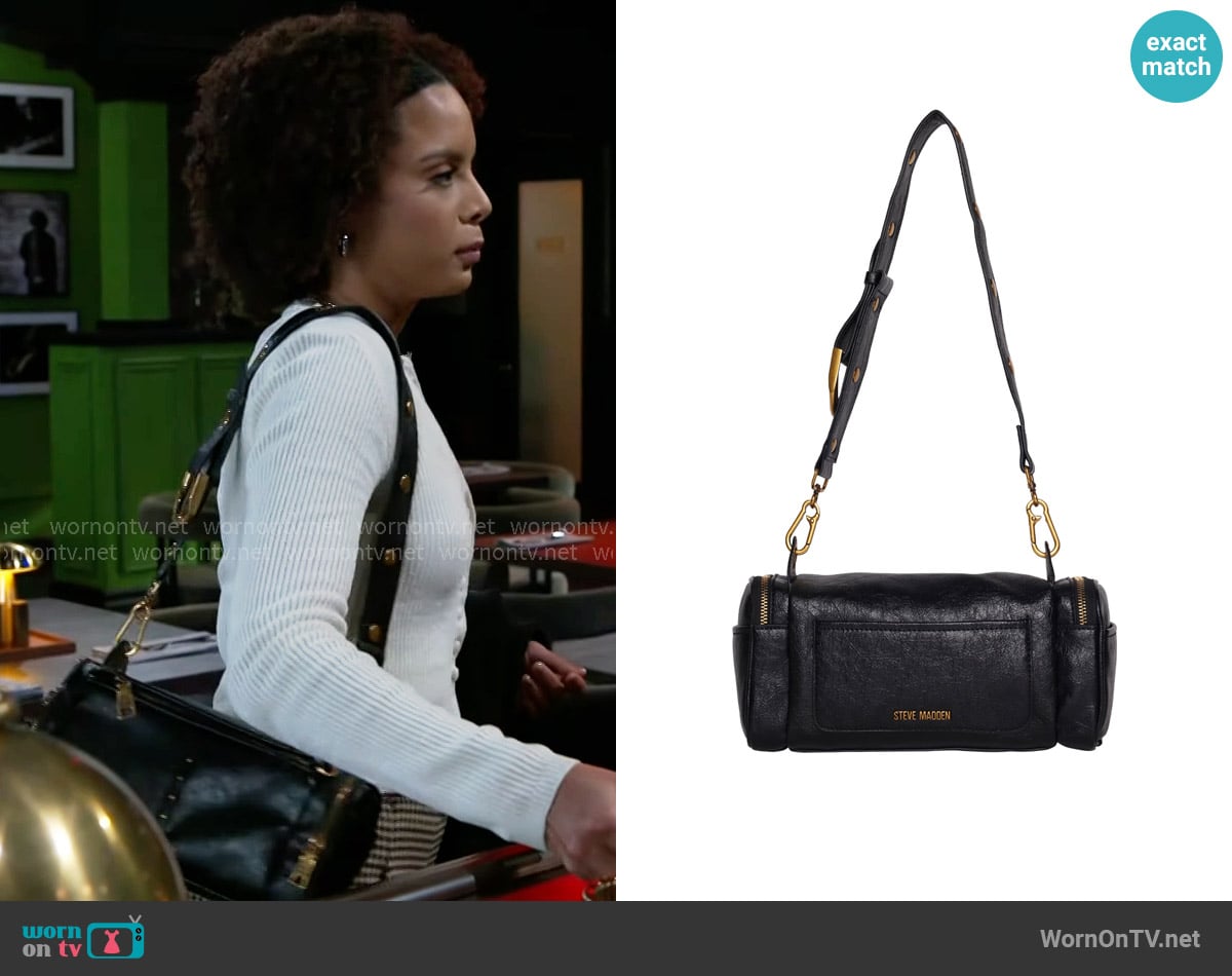 Steve Madden BConrad Bag worn by Deanna McBride (Angela Fairley) on Beyond the Gates