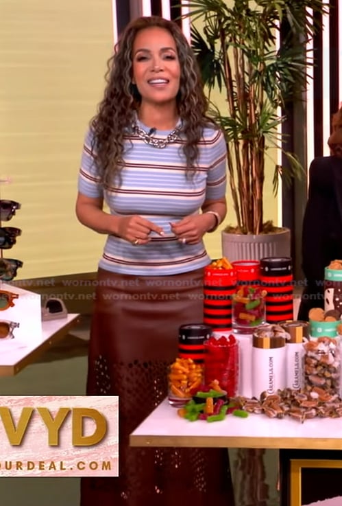 Sunny’s blue striped chain neck top and skirt on The View