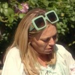 Sutton’s mint green embroidered blouse on The Real Housewives of Beverly Hills