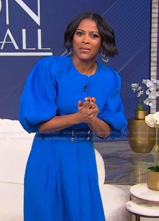 Tamron’s blue belted dress on Tamron Hall Show