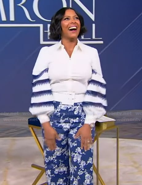 Tamron's embroidered blouse and floral pants on Tamron Hall Show