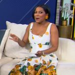 Tamron’s white floral sleeveless dress on Tamron Hall Show