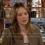 Tessa's snake print dress and brown studded jacket on The Young and the Restless