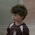 Theo's burgundy print long sleeve tee on 9-1-1