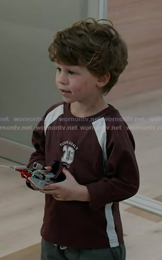 Theo's burgundy print long sleeve tee on 9-1-1