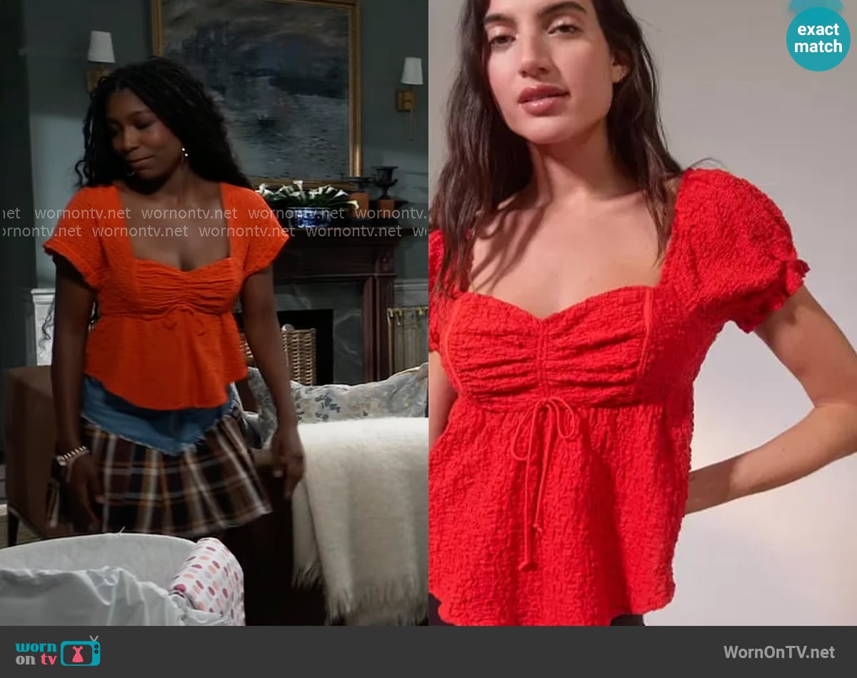 Urban Outfitters Beverly Textured Lace-Up Babydoll Blouse in Red worn by Trina Robinson (Tabyana Ali) on General Hospital