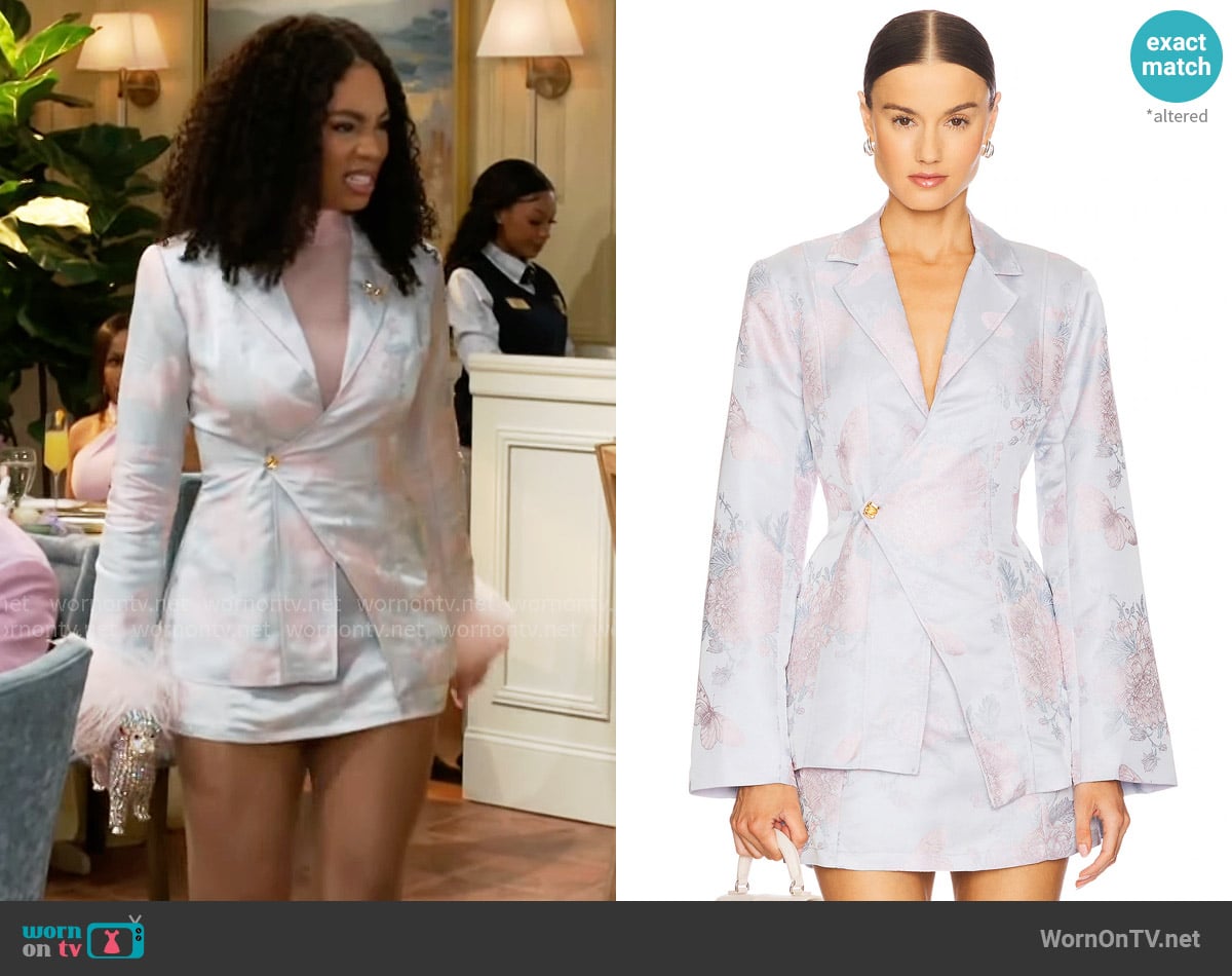 Yellow the Label Sylvie Asymmetrical Jacket in Azura worn by Chelsea Hamilton (RhonniRose Mantilla) on Beyond the Gates