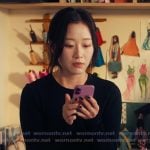 Yuri's black bow hem top and skirt on XO Kitty