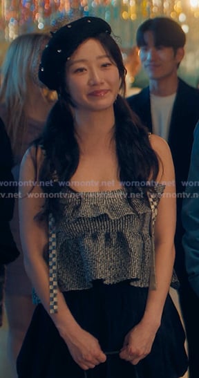 Yuri's grey peplum top on XO Kitty