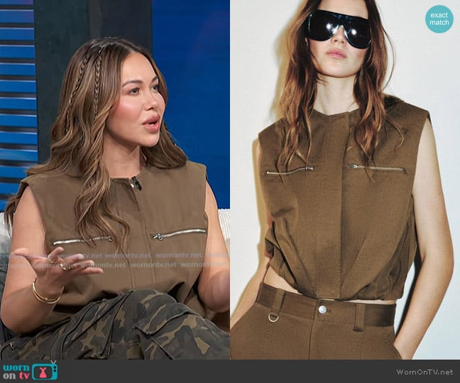 Zara Puffer Vest with Zippers in Khaki worn by Chiquis Rivera on Access Hollywood