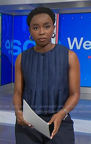 Zinhle’s navy pleated peplum top on NBC News Daily