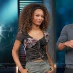 Zuri's black floral print top and cargo pants on Access Hollywood