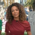 Zuri's red gathered top on Access Hollywood