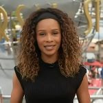 Zuri’s black ribbed cap sleeve top on Access Hollywood