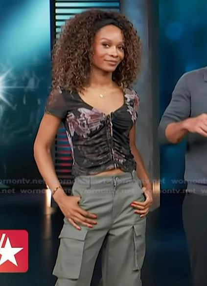 Zuri’s black floral print top and cargo pants on Access Hollywood