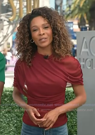 Zuri’s red gathered top on Access Hollywood