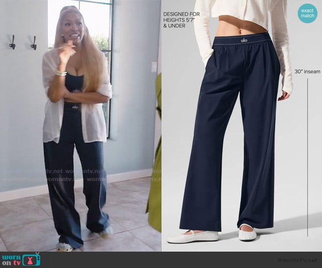 Drew’s navy alo logo pants on RHOA