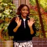 Ayo Edebiri’s black half-zip sweater and asymmetric skirt on The View