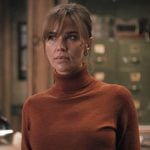 Belle’s red turtleneck sweater on Marshals
