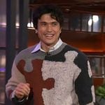 Charles Melton’s puzzle piece sweater on The Kelly Clarkson Show
