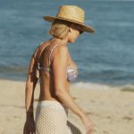 Lindsay’s blue floral bikini top and crochet knit pants on Summer House
