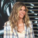 Dina Doll’s plaid blazer on Access Hollywood