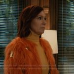 Elsbeth’s orange fur star embellished jacket on Elsbeth