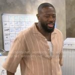 Malcolm’s beige striped shirt on The Neighborhood