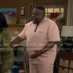 Calvin’s light pink polo shirt and matching shorts on The Neighborhood