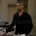 Izaiah’s black shirt and printed pants on Beyond the Gates