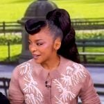 Kara Young’s pink embellished cardigan and print skirt on The View