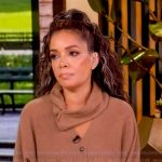 Sunny’s beige scarf neck cardigan on The View