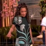 Sunny’s blue printed feather trim dress on The View